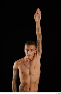 Claudio  1 arm flexing front view nude tattoo 0005.jpg